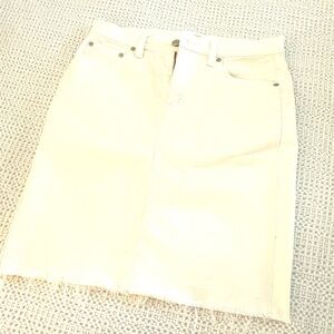 NWOT J Crew white jean skirt with raw hem.